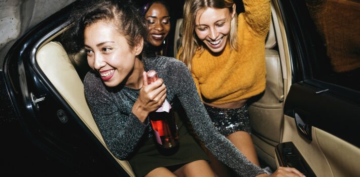 Diverse Women in a backseat of Lake Travis Limo Car